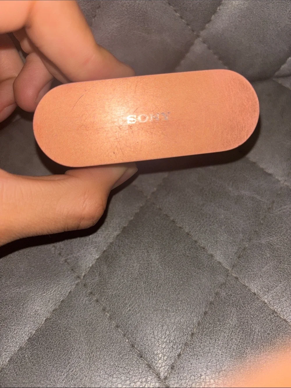 Sony Earbud Charging Case in Black and Rose Gold
